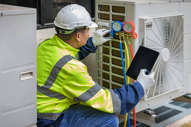 Professional Ac Installation technician working in Mims, FL